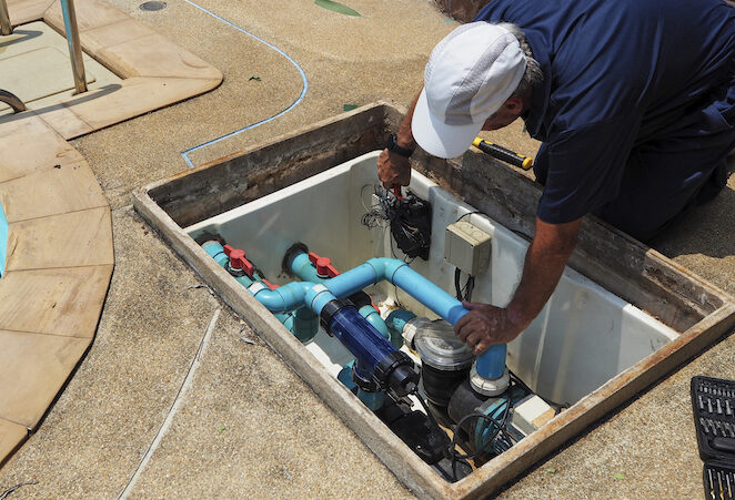 Technician fixing pool