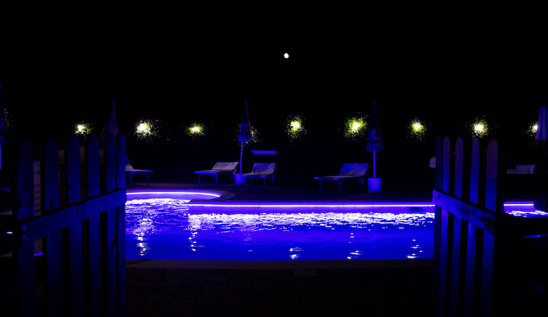 blue light swimming pool at night