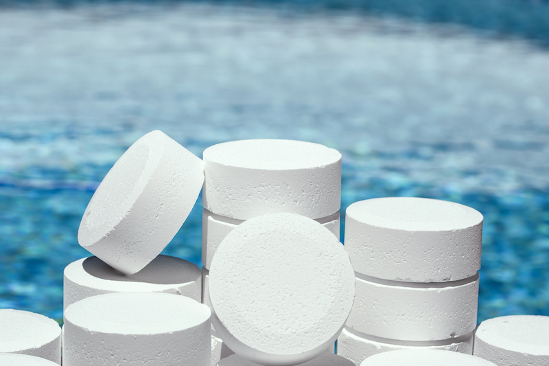 Chlorine tablets for pool maintenance. Chlorine powder or tablets is the most common disinfectant for pool water, a very effective solution and it is a chemical product.