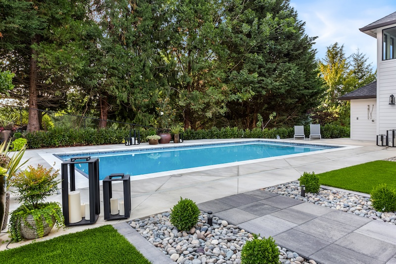 in-ground pool with blue water