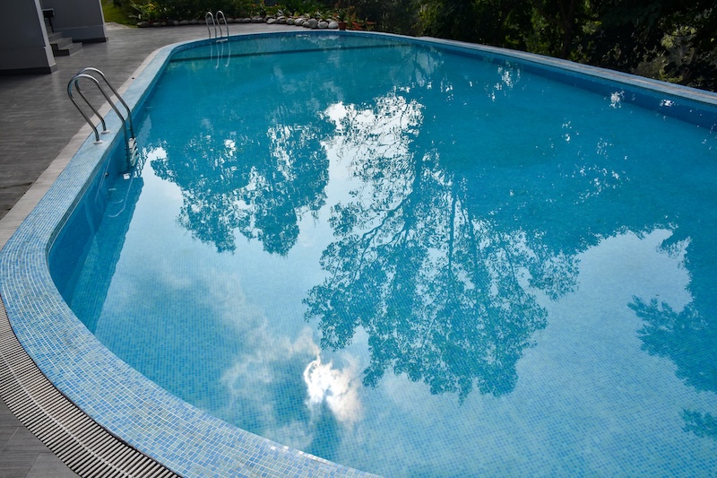 Swimming pool with blue and clear water