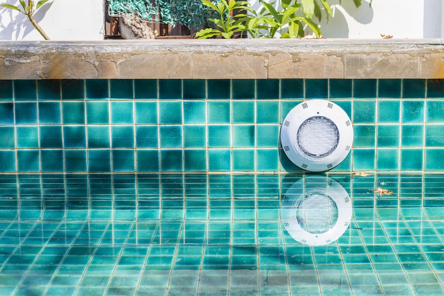 LED swimming pool light on tile wall