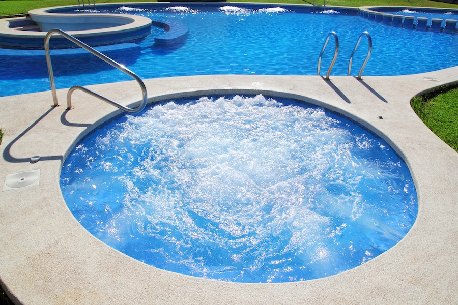 blue jet spa pool in green grass garden outdoor dayspa