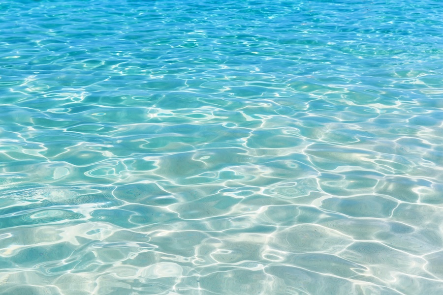 Surface of water in swimming pool.