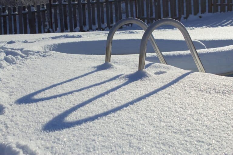 Ice swimming pool in the winter, Steps, hand-rails, garden chair
