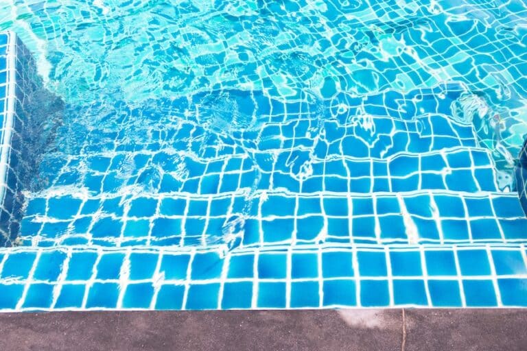Stair concrete with blue stripe tile to Swimming Pool, Blue tile with white stripe line