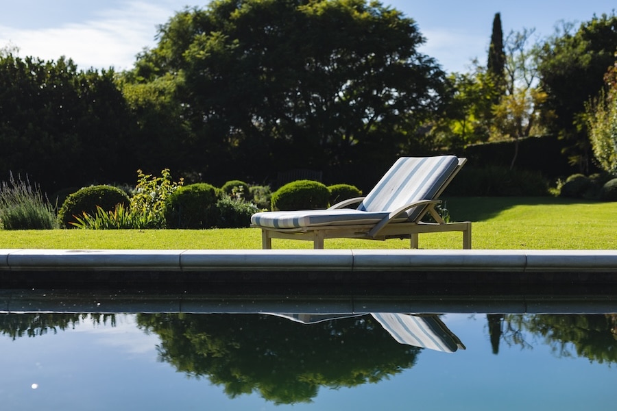 general-view-of-tranquil-swimming-pool-and-deckchair-with-stunning-mountains-countryside-2