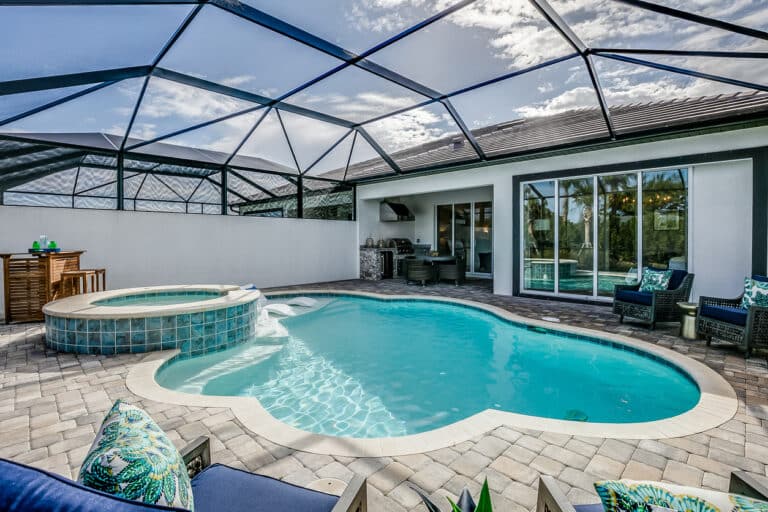 Cloud shaped pool with net enclosure