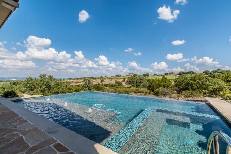 Wide open view of landscape while lounging poolside